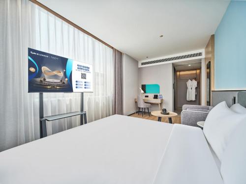 Imagen de la habitación del Hotel Country Inn & Suite by Radisson Xi\'an Bell Tower Ming City Wall. Foto 20