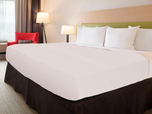 Imagen de la habitación del Hotel Country Inn & Suites By Radisson, Braselton. Foto 6