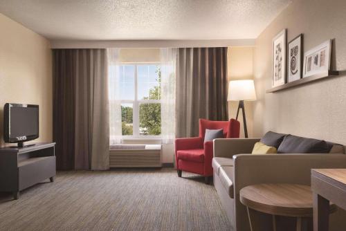 Imagen de la habitación del Hotel Country Inn & Suites By Radisson, Cottage Grove, MN. Foto 11