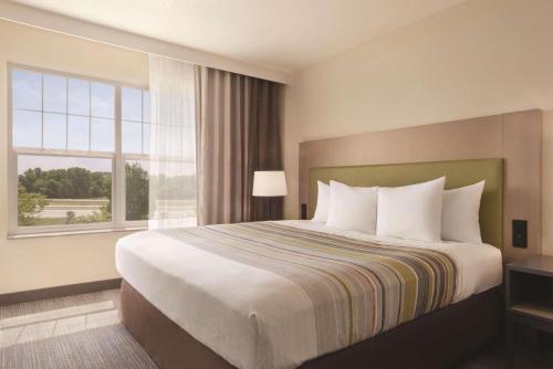 Imagen de la habitación del Hotel Country Inn & Suites By Radisson, Cottage Grove, MN. Foto 12