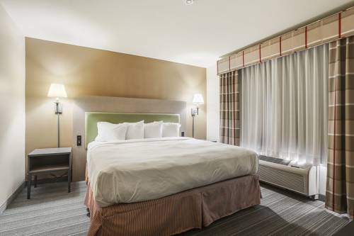 Imagen de la habitación del Hotel Country Inn & Suites By Radisson, Green Bay, Wi. Foto 12
