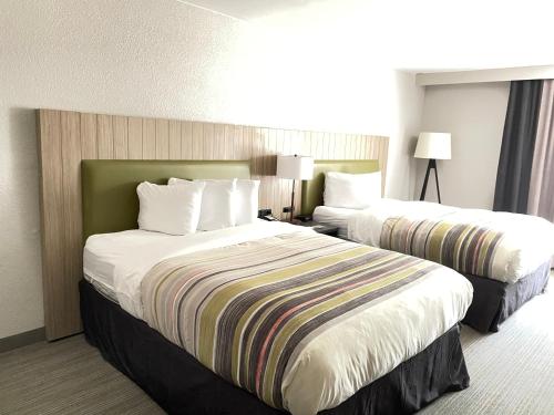 Imagen de la habitación del Hotel Country Inn & Suites By Radisson, Greenville, Nc. Foto 19