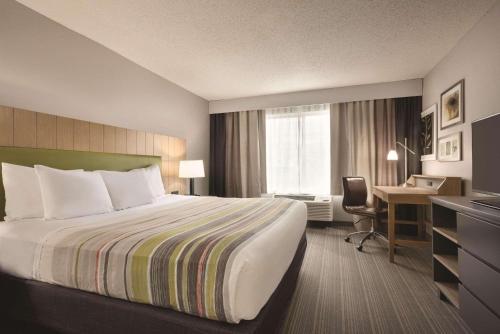 Imagen de la habitación del Hotel Country Inn & Suites By Radisson, Merrillville, In. Foto 9