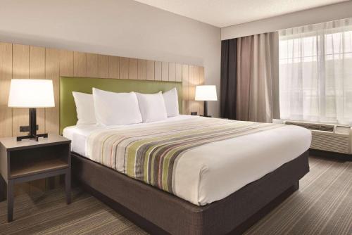 Imagen de la habitación del Hotel Country Inn & Suites By Radisson, Merrillville, In. Foto 15
