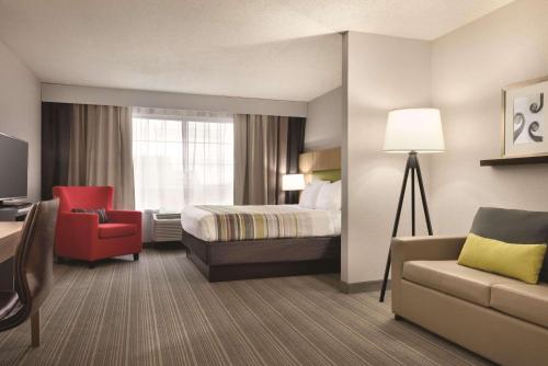 Imagen de la habitación del Hotel Country Inn & Suites By Radisson, Merrillville, In. Foto 17