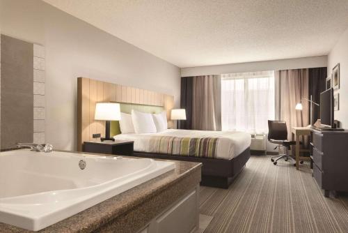 Imagen de la habitación del Hotel Country Inn & Suites By Radisson, Merrillville, In. Foto 18