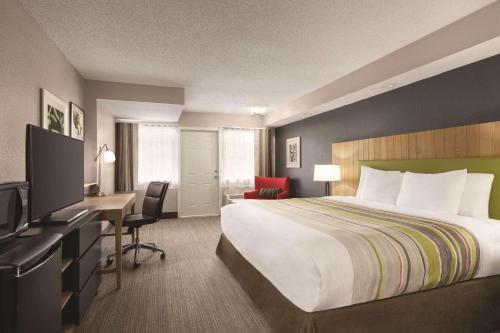 Imagen de la habitación del Hotel Country Inn & Suites By Radisson, Pigeon Forge Sou. Foto 17