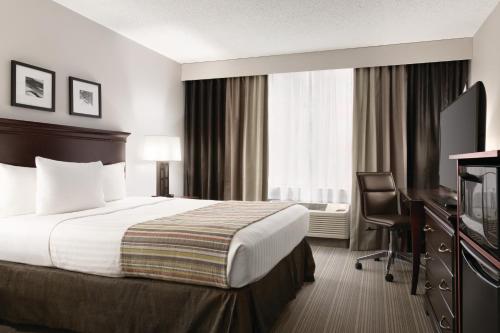 Imagen de la habitación del Hotel Country Inn & Suites By Radisson, Traverse City, MI. Foto 14