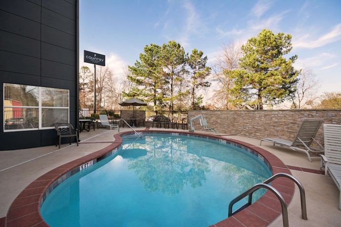 Imagen de la piscina del Hotel Country Inn & Suites by Radisson, Atlanta I-75 South, GA. Foto 19