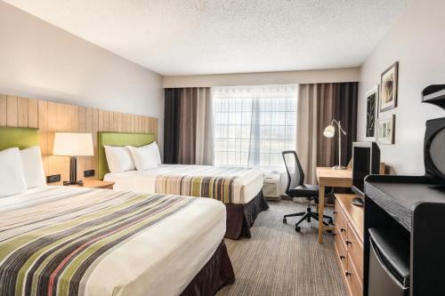 Imagen de la habitación del Hotel Country Inn & Suites by Radisson, Big Flats (Elmira), NY. Foto 10