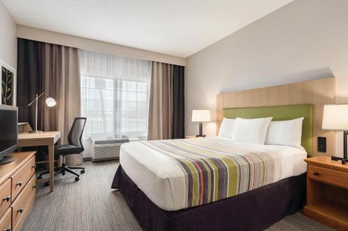 Imagen de la habitación del Hotel Country Inn & Suites by Radisson, Big Flats (Elmira), NY. Foto 16