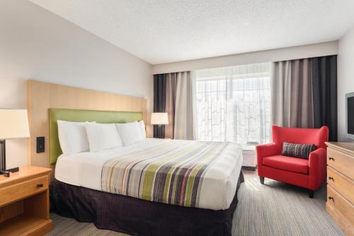 Imagen de la habitación del Hotel Country Inn & Suites by Radisson, Big Flats (Elmira), NY. Foto 17