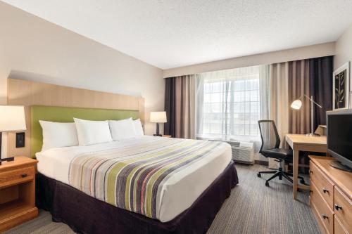 Imagen de la habitación del Hotel Country Inn & Suites by Radisson, Big Flats (Elmira), NY. Foto 18