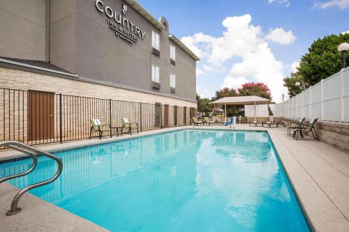 Imagen de la piscina del Hotel Country Inn and Suites By Radisson, Austin North (pflugerville), Tx. Foto 20