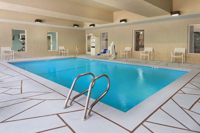 Imagen de la piscina del Hotel Country Inn and Suites By Radisson, Brunswick I-95, Ga. Foto 20