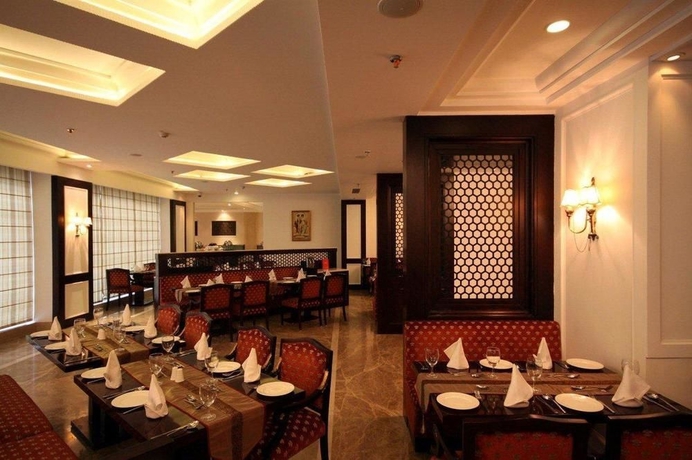 Imagen del bar/restaurante del Hotel Country Inn and Suites By Radisson, Delhi Satbari. Foto 1