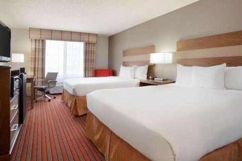 Imagen de la habitación del Hotel Country Inn and Suites By Radisson, Dfw Airport South, Tx. Foto 15