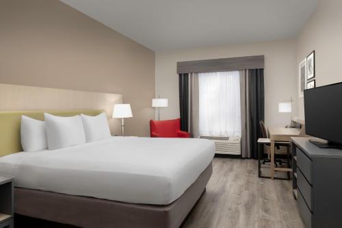 Imagen de la habitación del Hotel Country Inn and Suites By Radisson, Gainesville, Fl. Foto 15