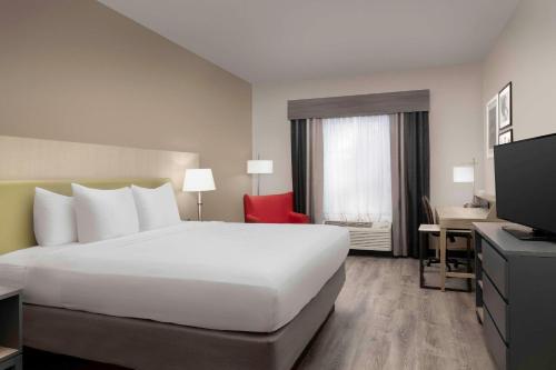 Imagen de la habitación del Hotel Country Inn and Suites By Radisson, Gainesville, Fl. Foto 16