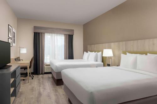 Imagen de la habitación del Hotel Country Inn and Suites By Radisson, Gainesville, Fl. Foto 19