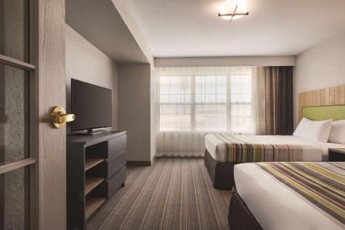 Imagen de la habitación del Hotel Country Inn and Suites By Radisson, Green Bay East, Wi. Foto 11