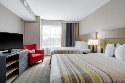 Imagen de la habitación del Hotel Country Inn and Suites By Radisson, Green Bay East, Wi. Foto 15