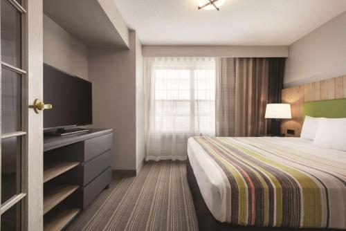 Imagen de la habitación del Hotel Country Inn and Suites By Radisson, Green Bay East, Wi. Foto 19