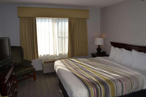 Imagen de la habitación del Hotel Country Inn and Suites By Radisson, Gurnee, Il. Foto 18