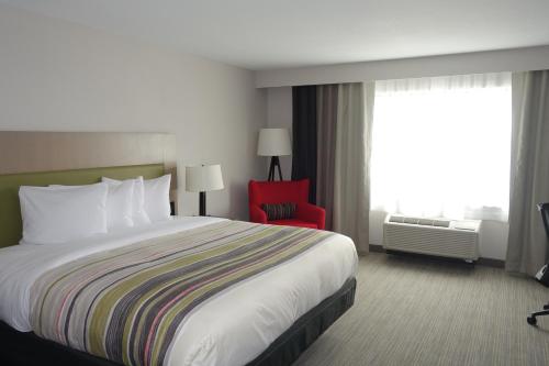 Imagen de la habitación del Hotel Country Inn and Suites By Radisson Lawrence. Foto 12