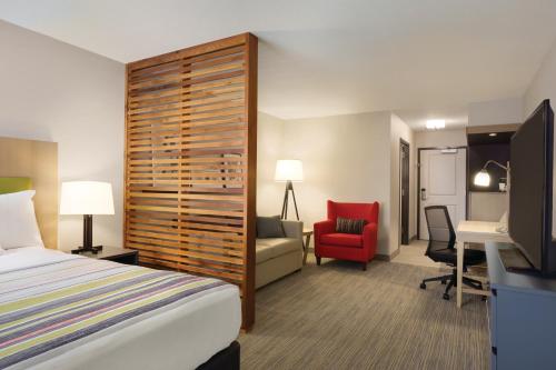 Imagen de la habitación del Hotel Country Inn and Suites By Radisson Lawrence. Foto 13