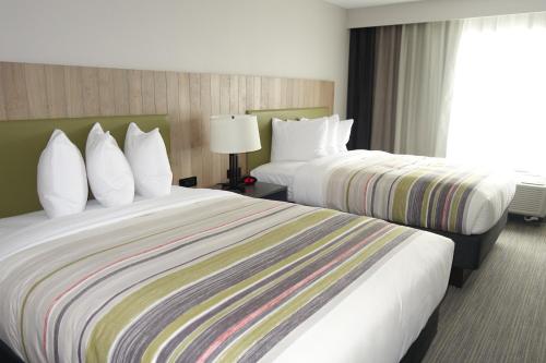 Imagen de la habitación del Hotel Country Inn and Suites By Radisson Lawrence. Foto 16