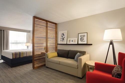 Imagen de la habitación del Hotel Country Inn and Suites By Radisson Lawrence. Foto 17