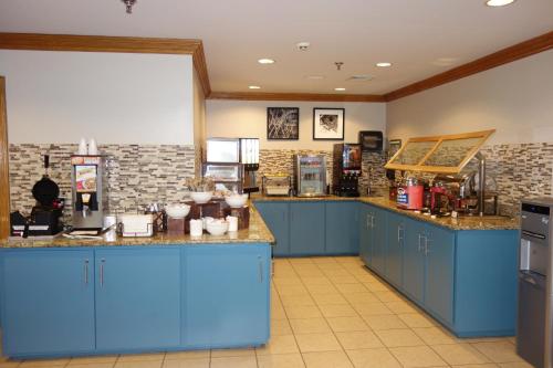 Imagen del bar/restaurante del Hotel Country Inn and Suites By Radisson, Lawrenceville, Ga. Foto 12