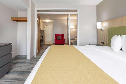 Imagen de la habitación del Hotel Country Inn and Suites By Radisson, Lewisville, Tx. Foto 17