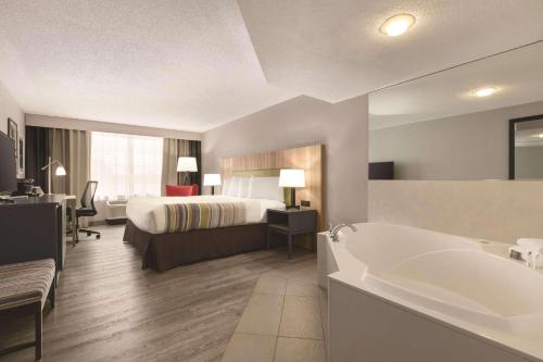 Imagen de la habitación del Hotel Country Inn and Suites By Radisson, London, Ky. Foto 16