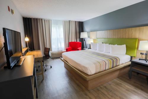 Imagen de la habitación del Hotel Country Inn and Suites By Radisson, Myrtle Beach, Sc. Foto 10