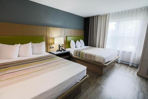 Imagen de la habitación del Hotel Country Inn and Suites By Radisson, Myrtle Beach, Sc. Foto 14
