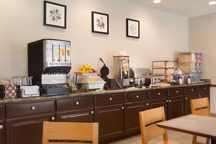 Imagen del bar/restaurante del Hotel Country Inn and Suites By Radisson, Norman, Ok. Foto 4