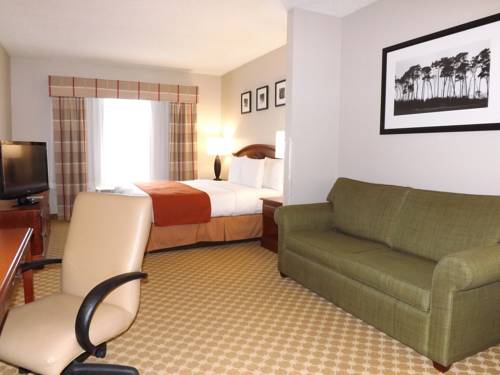 Imagen de la habitación del Hotel Country Inn and Suites By Radisson Ocala Southwest. Foto 4