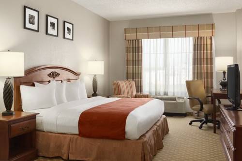 Imagen de la habitación del Hotel Country Inn and Suites By Radisson Ocala Southwest. Foto 8