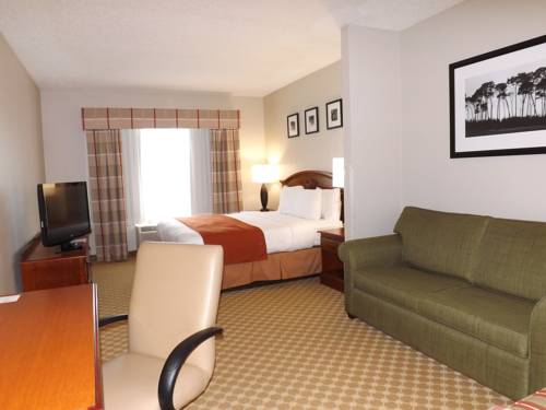 Imagen de la habitación del Hotel Country Inn and Suites By Radisson Ocala Southwest. Foto 10
