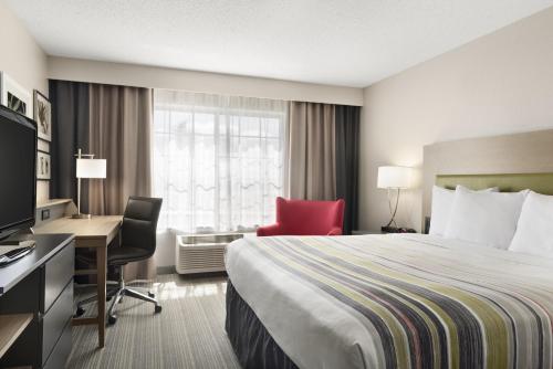 Imagen de la habitación del Hotel Country Inn and Suites By Radisson, Romeoville, Il. Foto 13