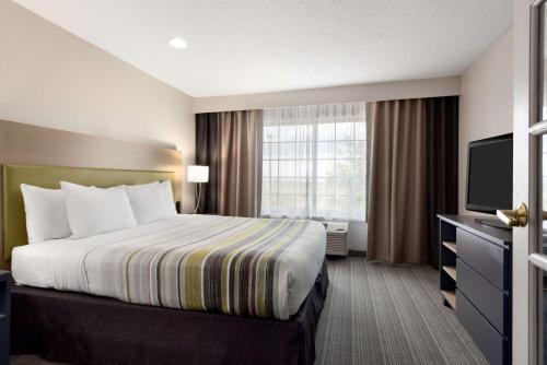 Imagen de la habitación del Hotel Country Inn and Suites By Radisson, Romeoville, Il. Foto 14