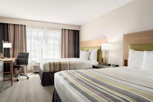 Imagen de la habitación del Hotel Country Inn and Suites By Radisson, Romeoville, Il. Foto 16