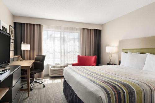 Imagen de la habitación del Hotel Country Inn and Suites By Radisson, Romeoville, Il. Foto 17