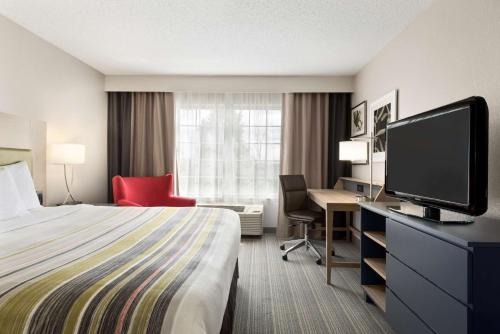 Imagen de la habitación del Hotel Country Inn and Suites By Radisson, Romeoville, Il. Foto 18