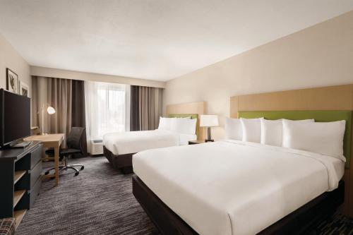 Imagen de la habitación del Hotel Country Inn and Suites By Radisson, Savannah Midtown, Ga. Foto 9