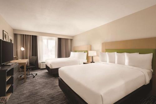 Imagen de la habitación del Hotel Country Inn and Suites By Radisson, Savannah Midtown, Ga. Foto 10
