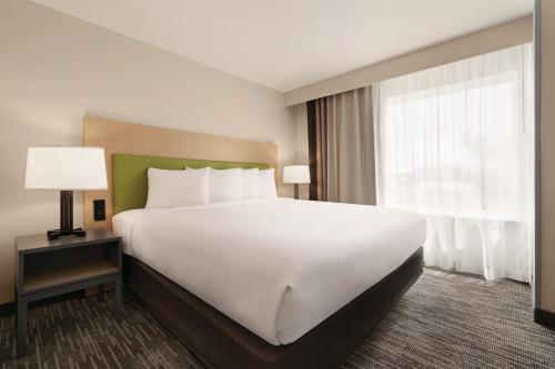 Imagen de la habitación del Hotel Country Inn and Suites By Radisson, Savannah Midtown, Ga. Foto 11