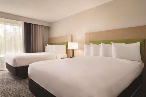 Imagen de la habitación del Hotel Country Inn and Suites By Radisson, Savannah Midtown, Ga. Foto 17